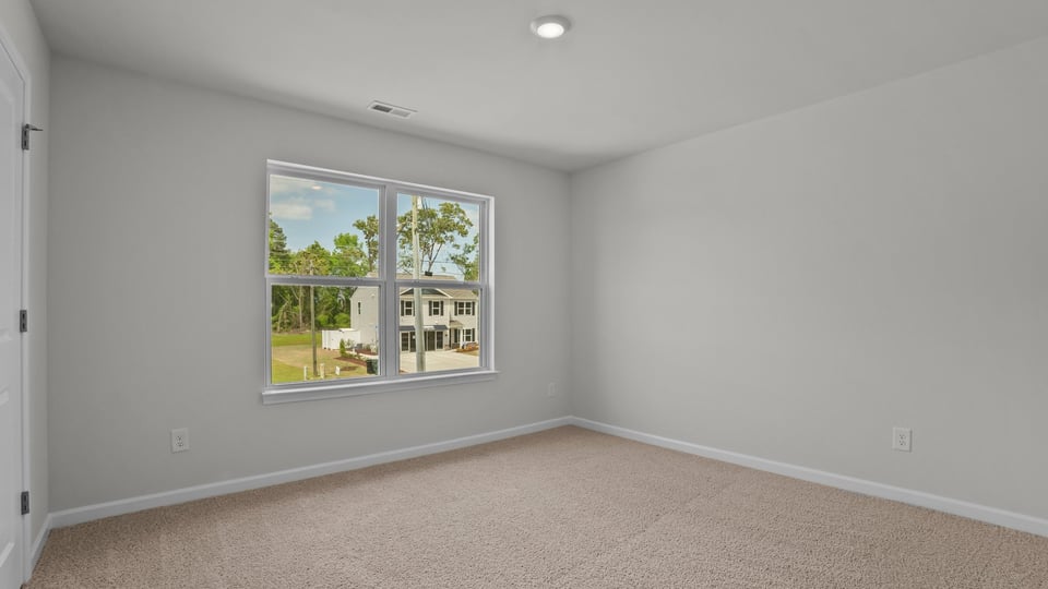 Bedroom with carpet flooring