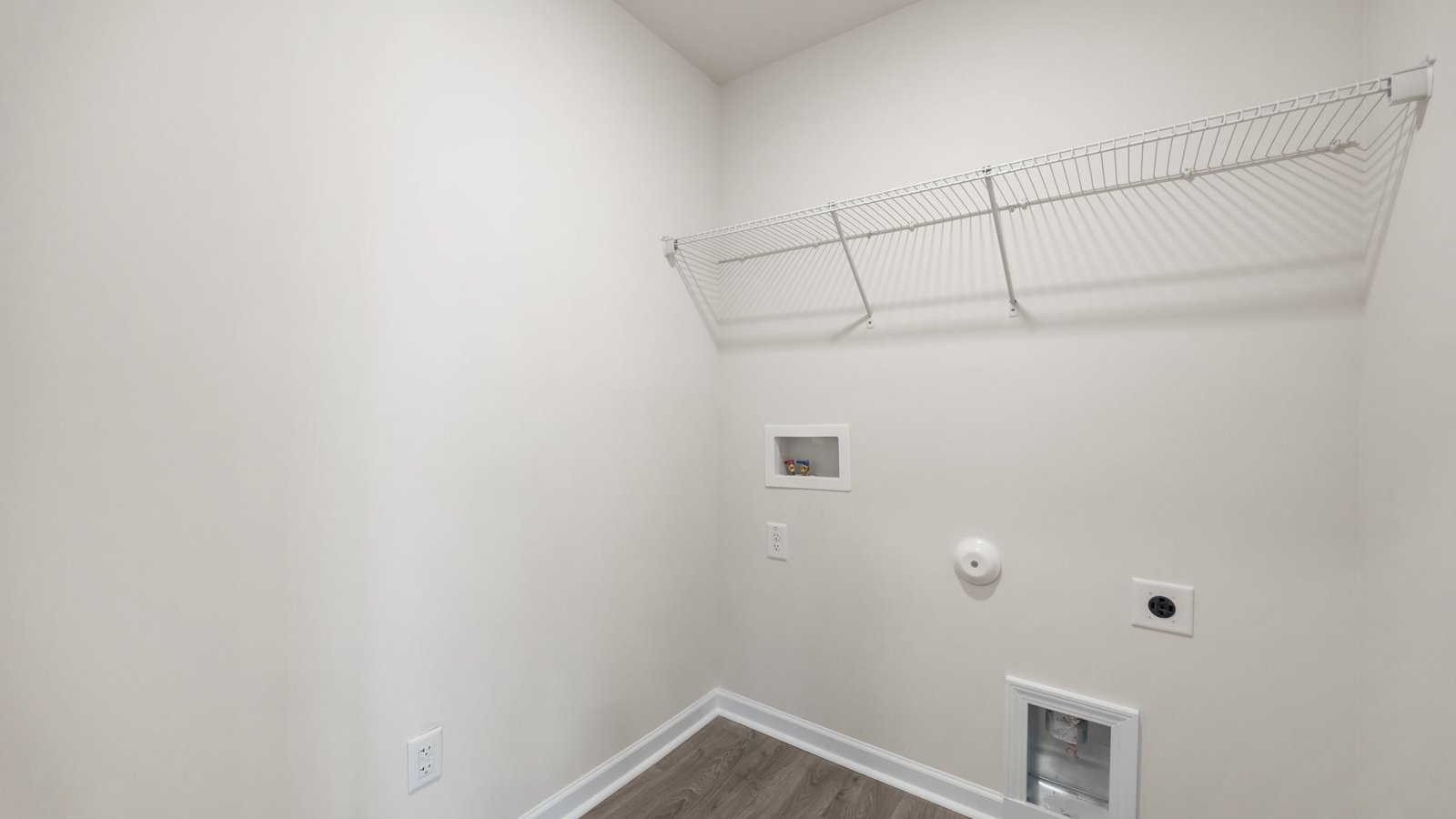 laundry room with shelving