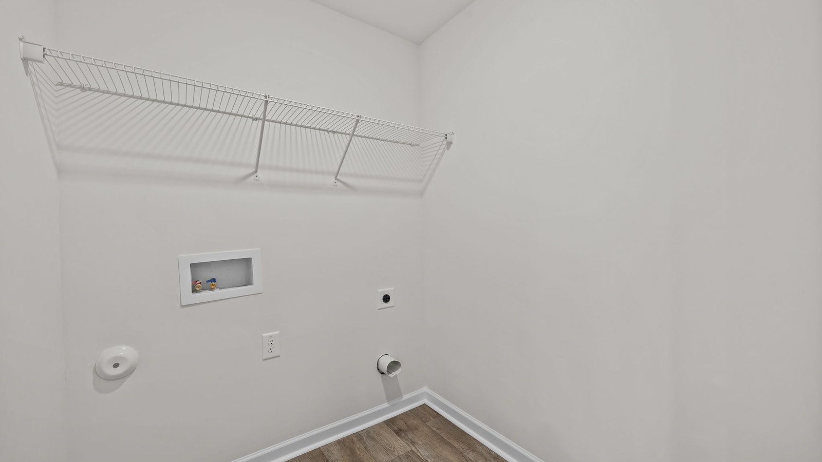 laundry room with shelving