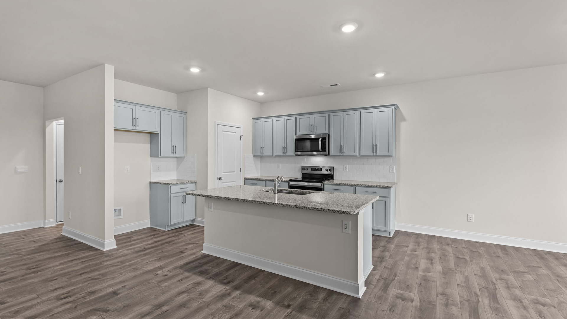 Kitchen with grey cabinets