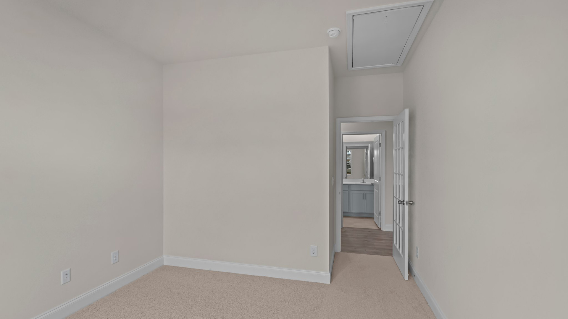 Bedroom with carpet flooring