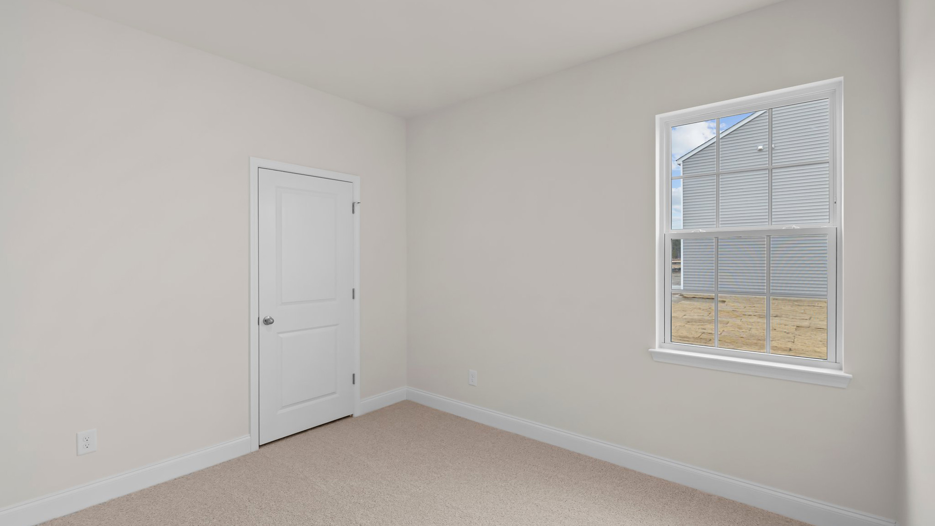 Bedroom with carpet flooring
