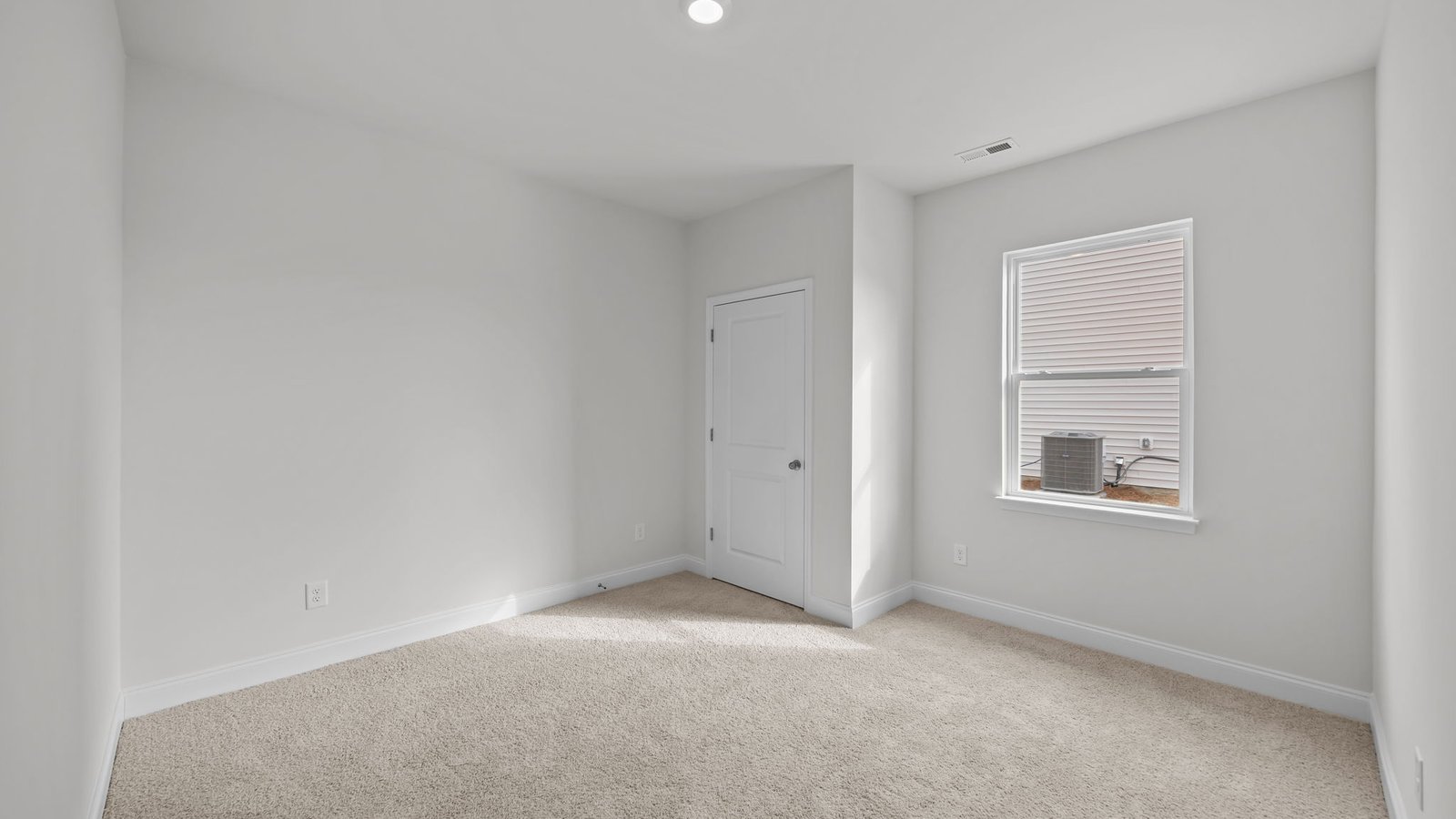 Bedroom with carpet flooring