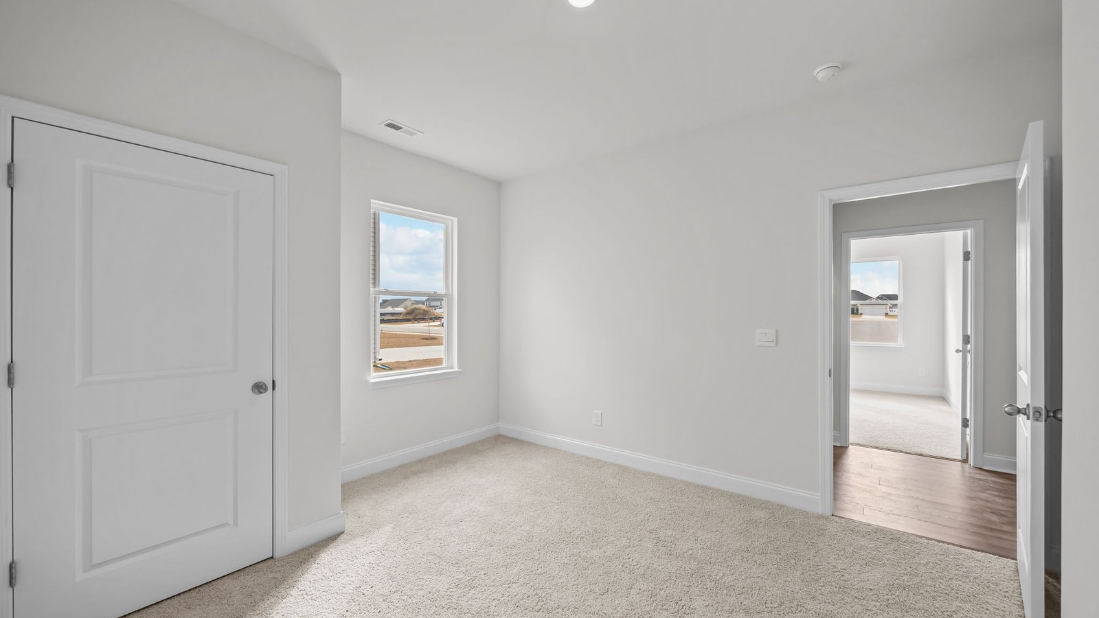 Bedroom with carpet flooring