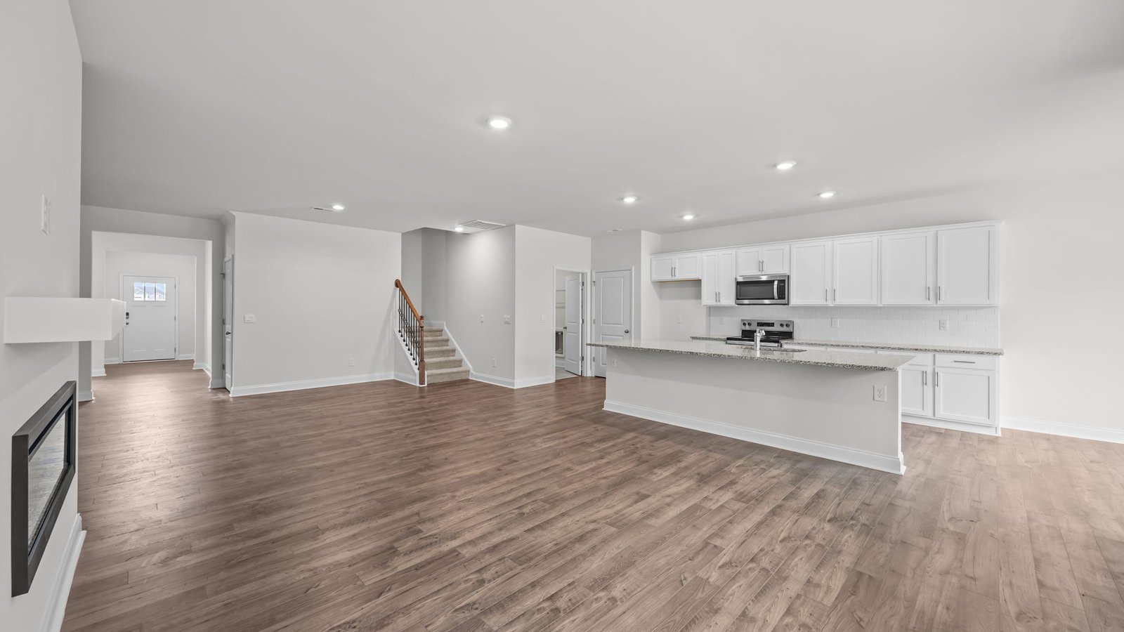 Open-concept living area with fireplace