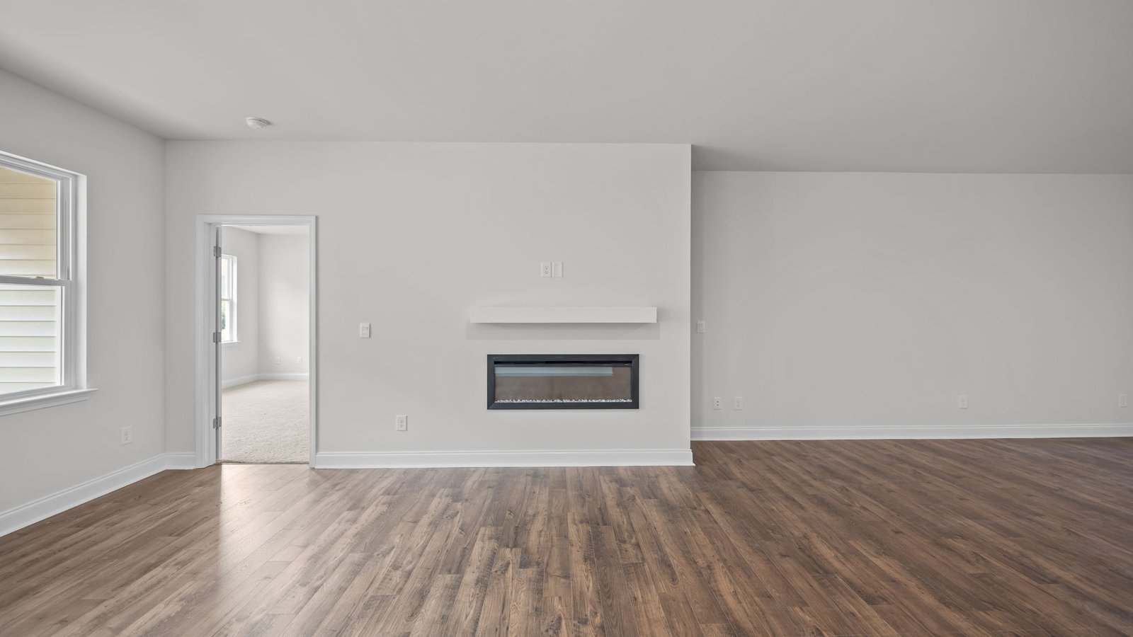 Open-concept living area with fireplace