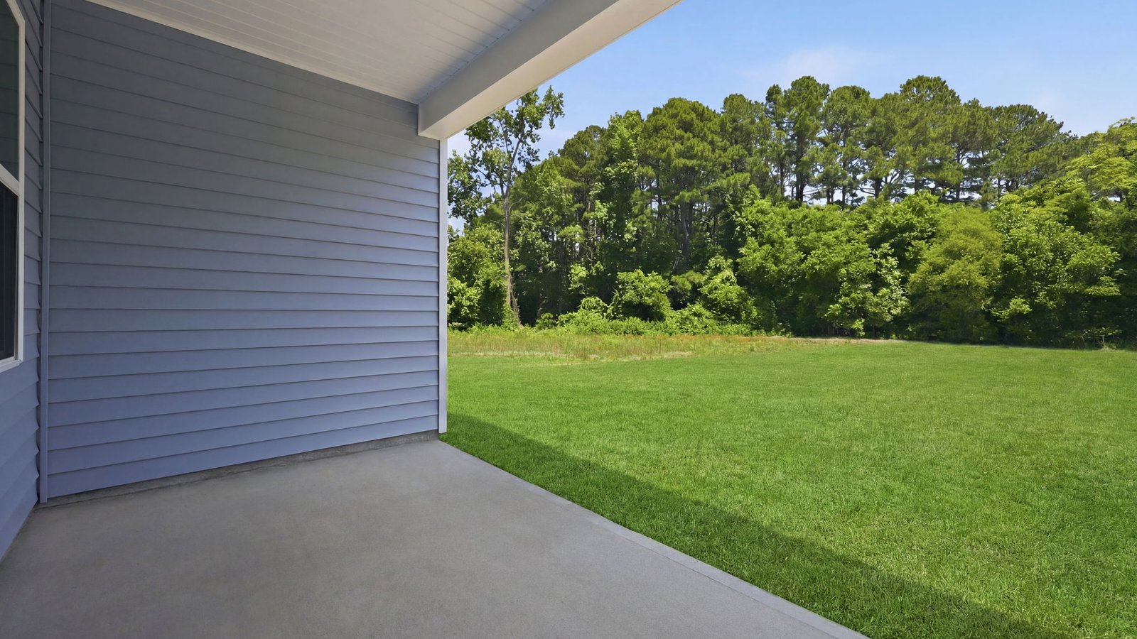 view into the backyard from covered back porch