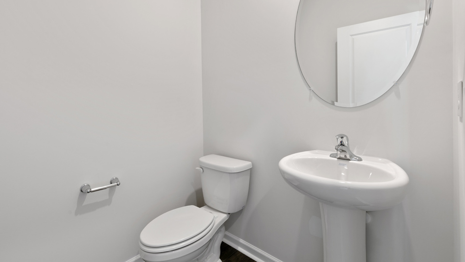 Bathroom with white cabinets