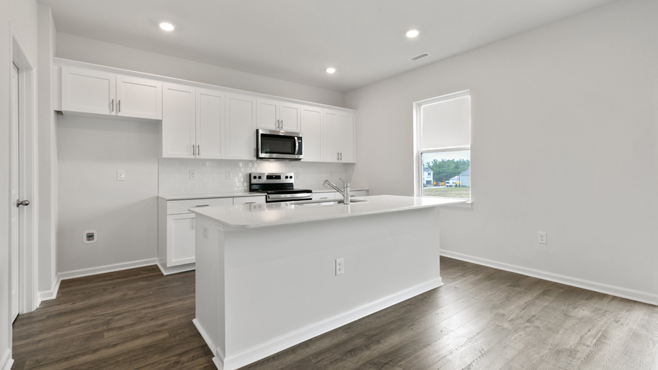 Kitchen with white cabinets