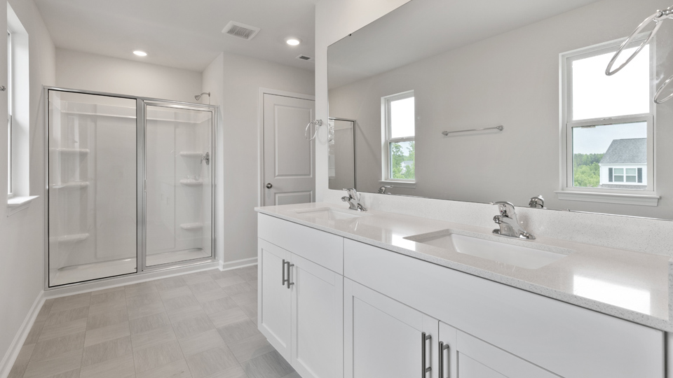 Bathroom with white cabinets