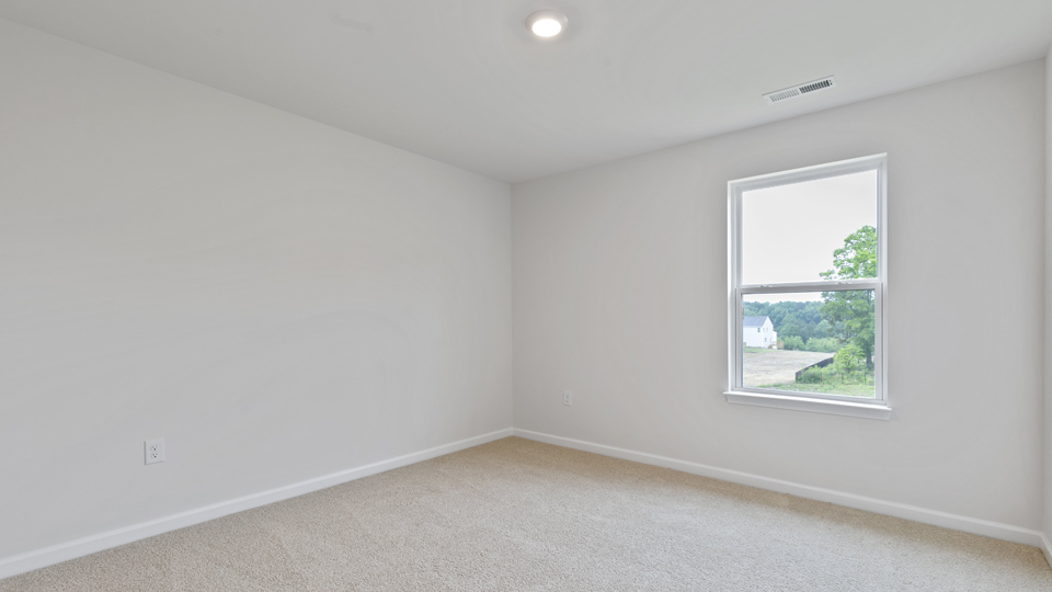 Bedroom with carpet