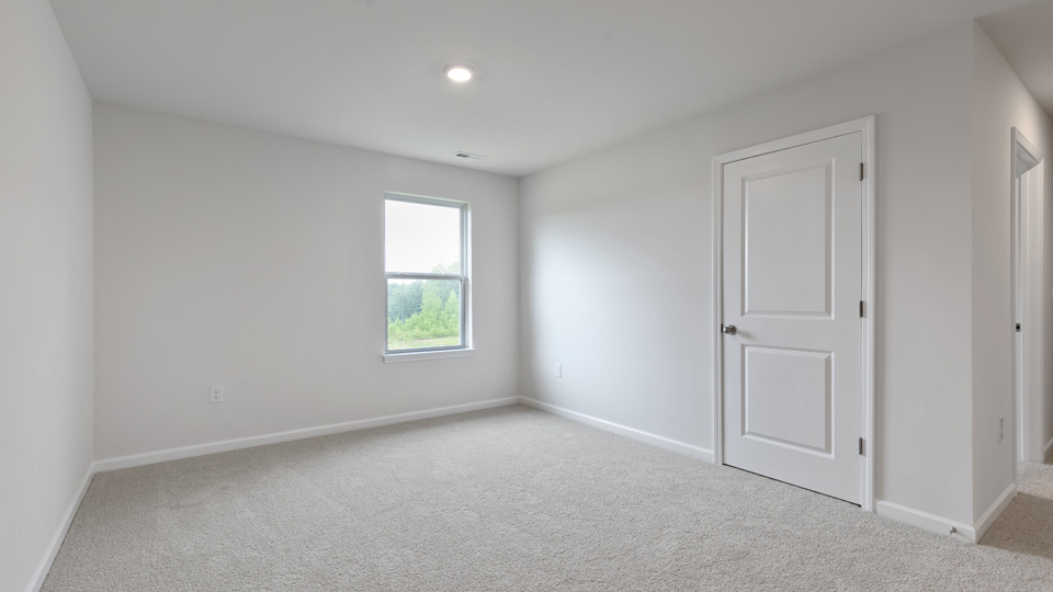 Loft area with carpet