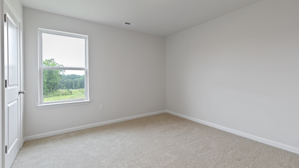 Loft area with carpet