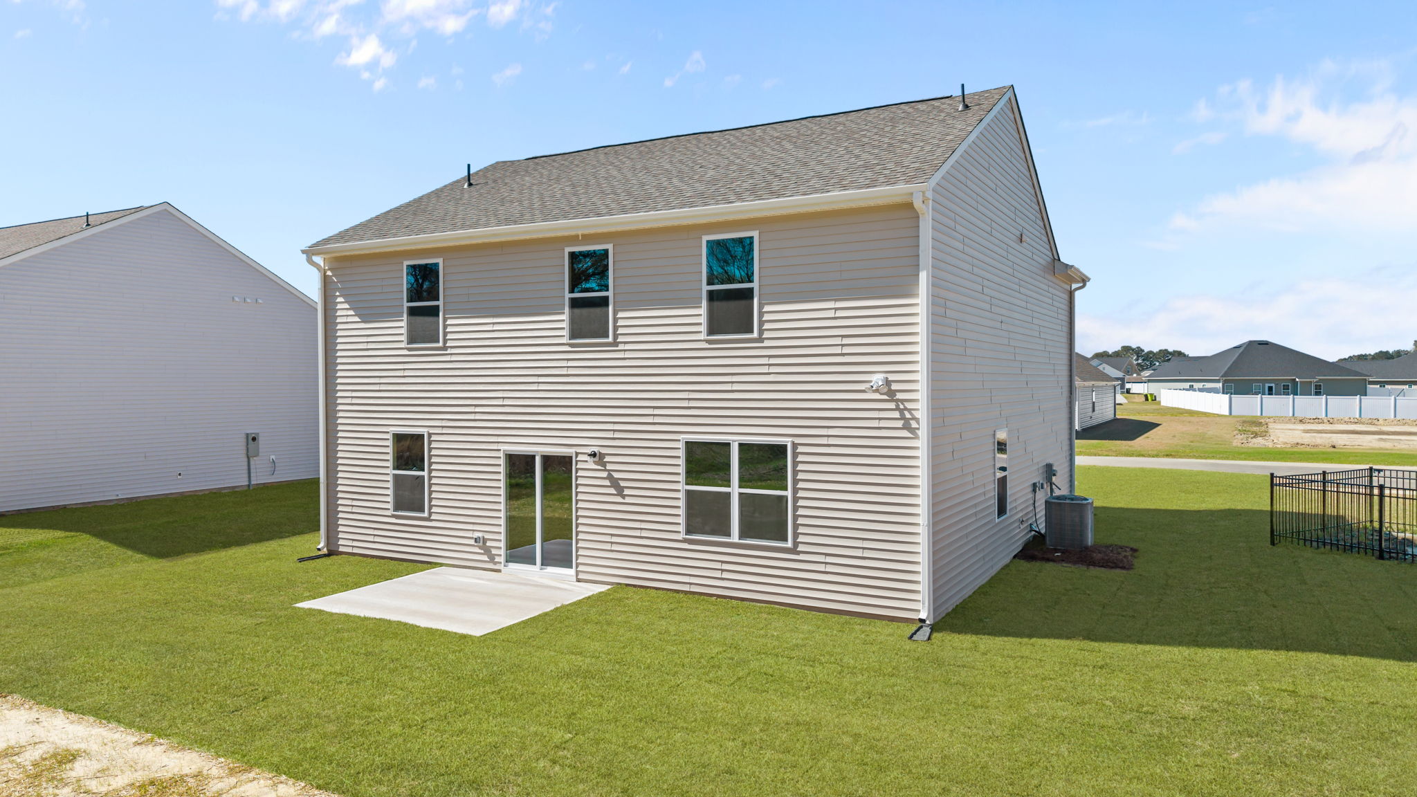 Exterior photo of the rear of the two story home
