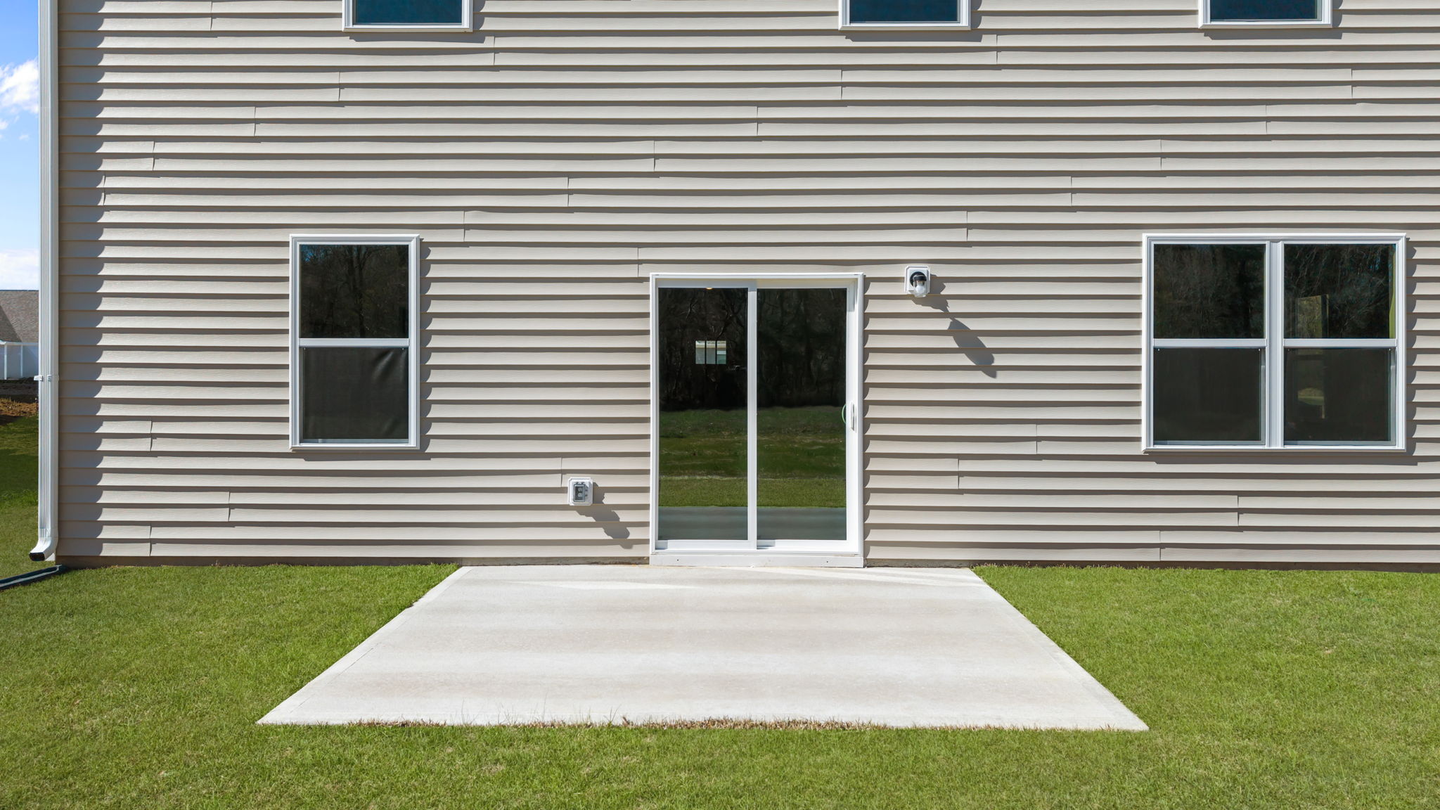 Back door photo with back patio pad