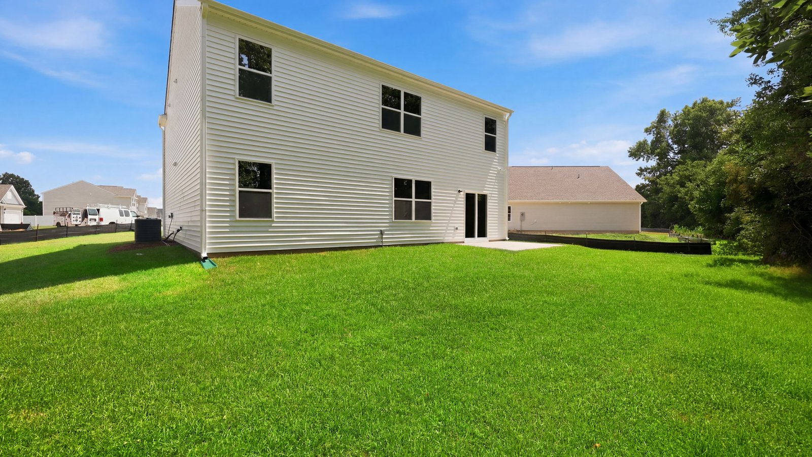 rear view of hayden floorplan with yard view