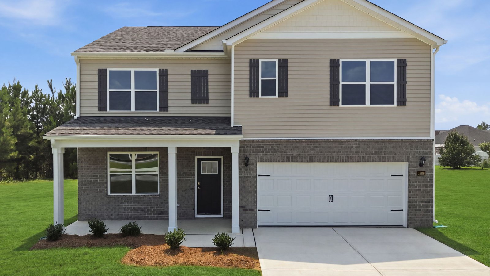 front view of home with two car garage