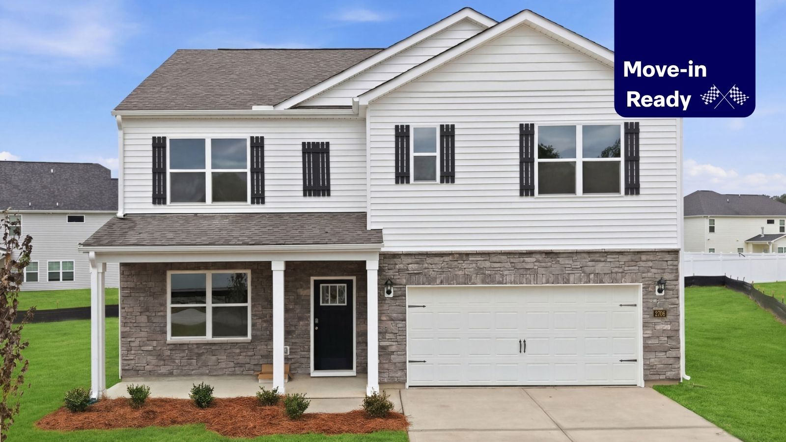 front view of home with brick and vinyl