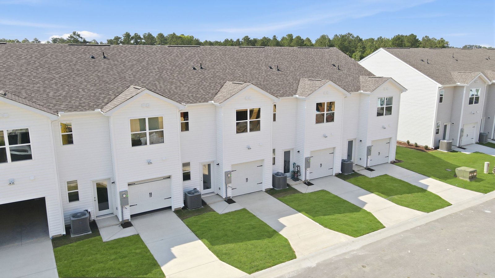 rear view of two story townhome