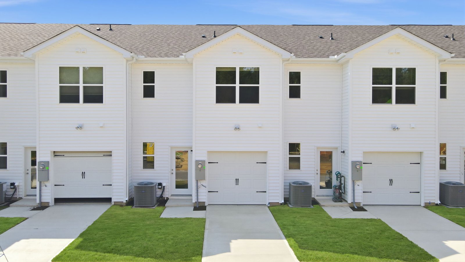 rear view of two story townhome