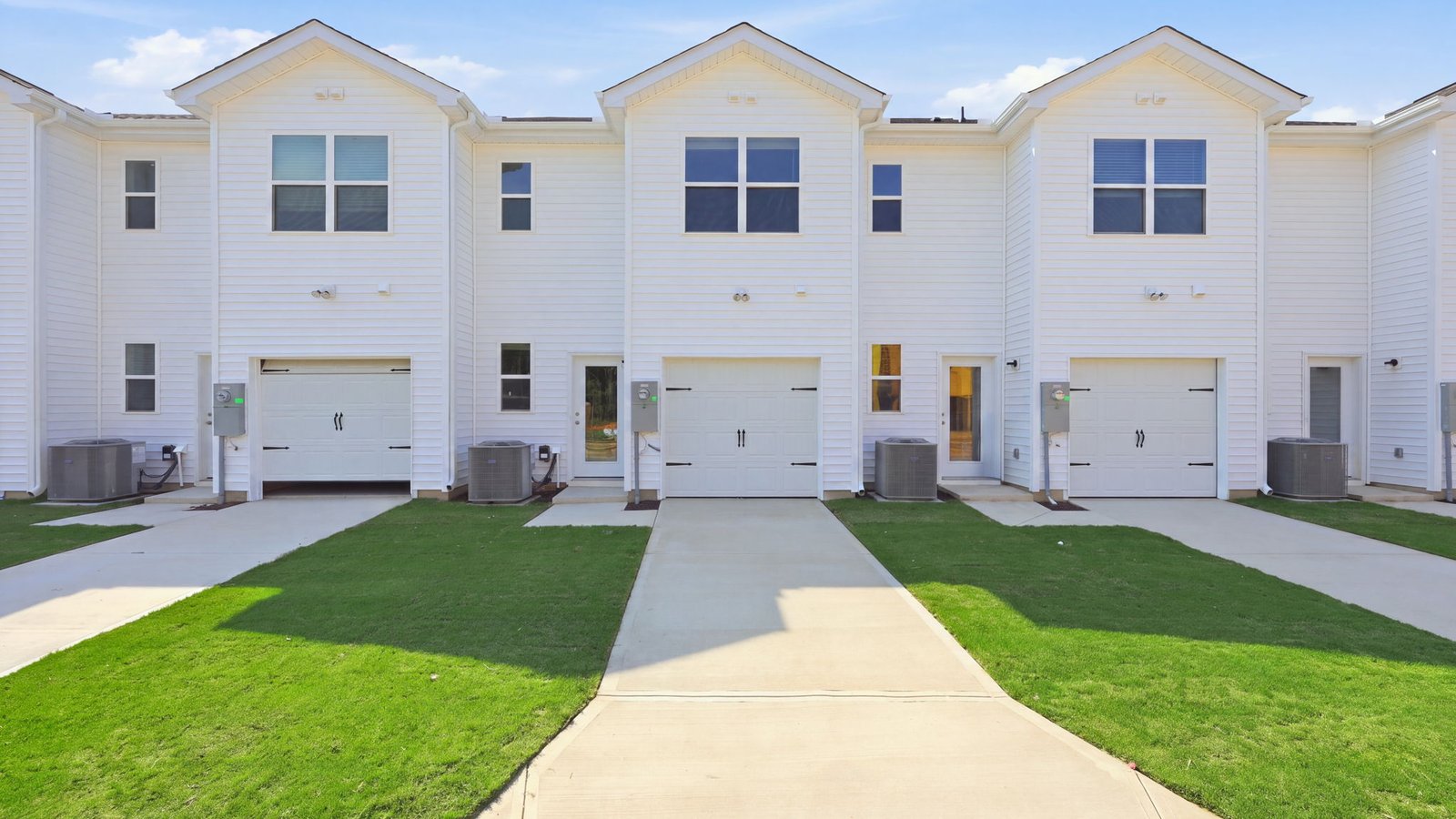 rear view of two story townhome