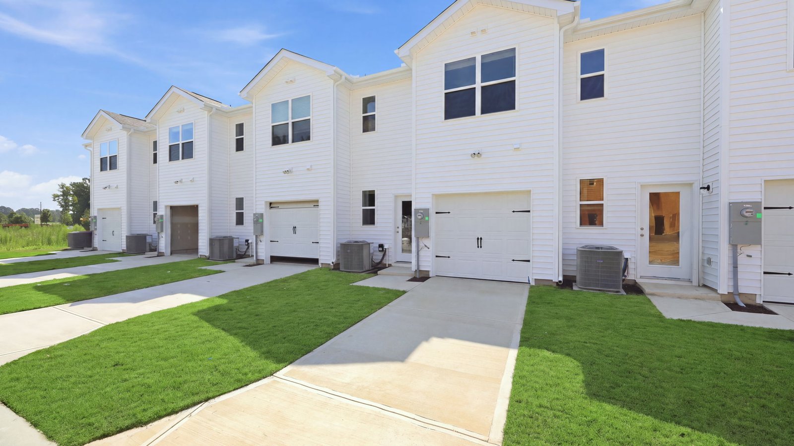 rear view of two story townhome