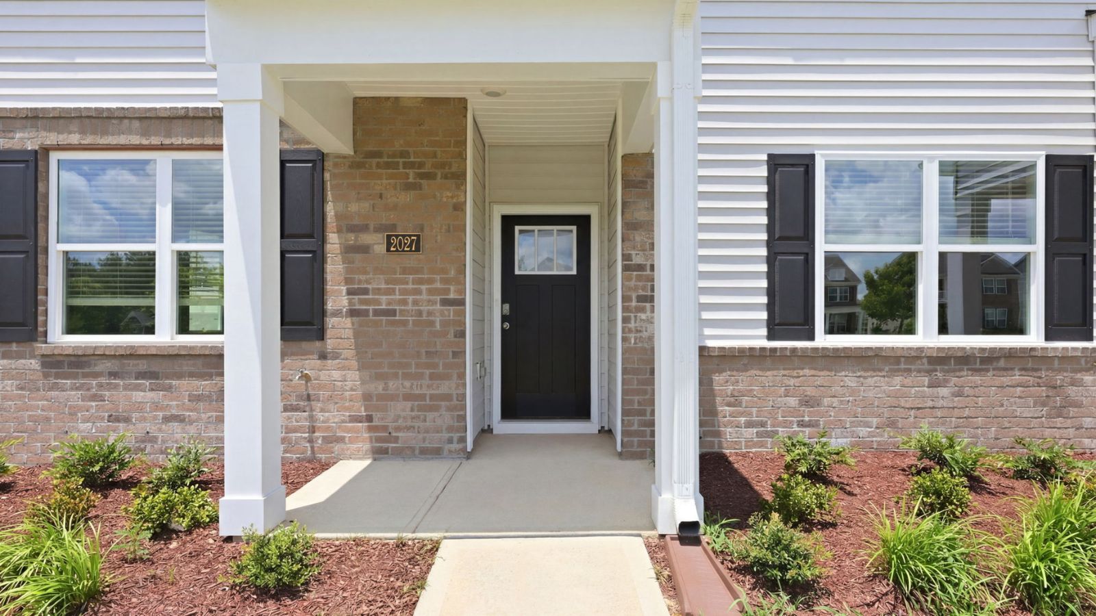front porch of two story townhome