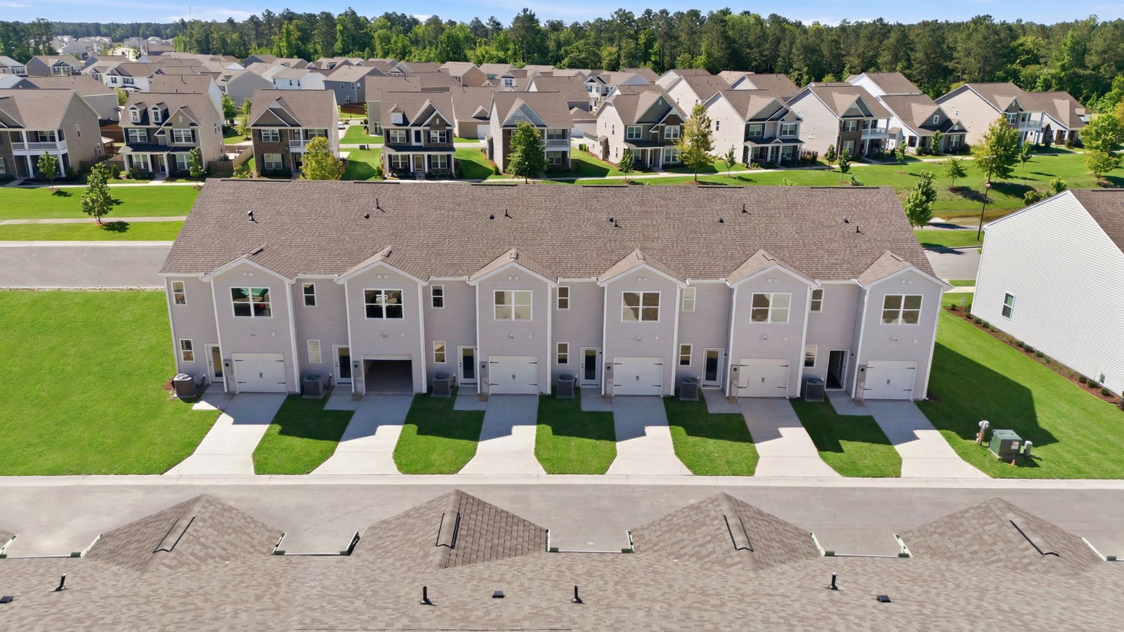 aerial photo of rear of building clock road townhomes