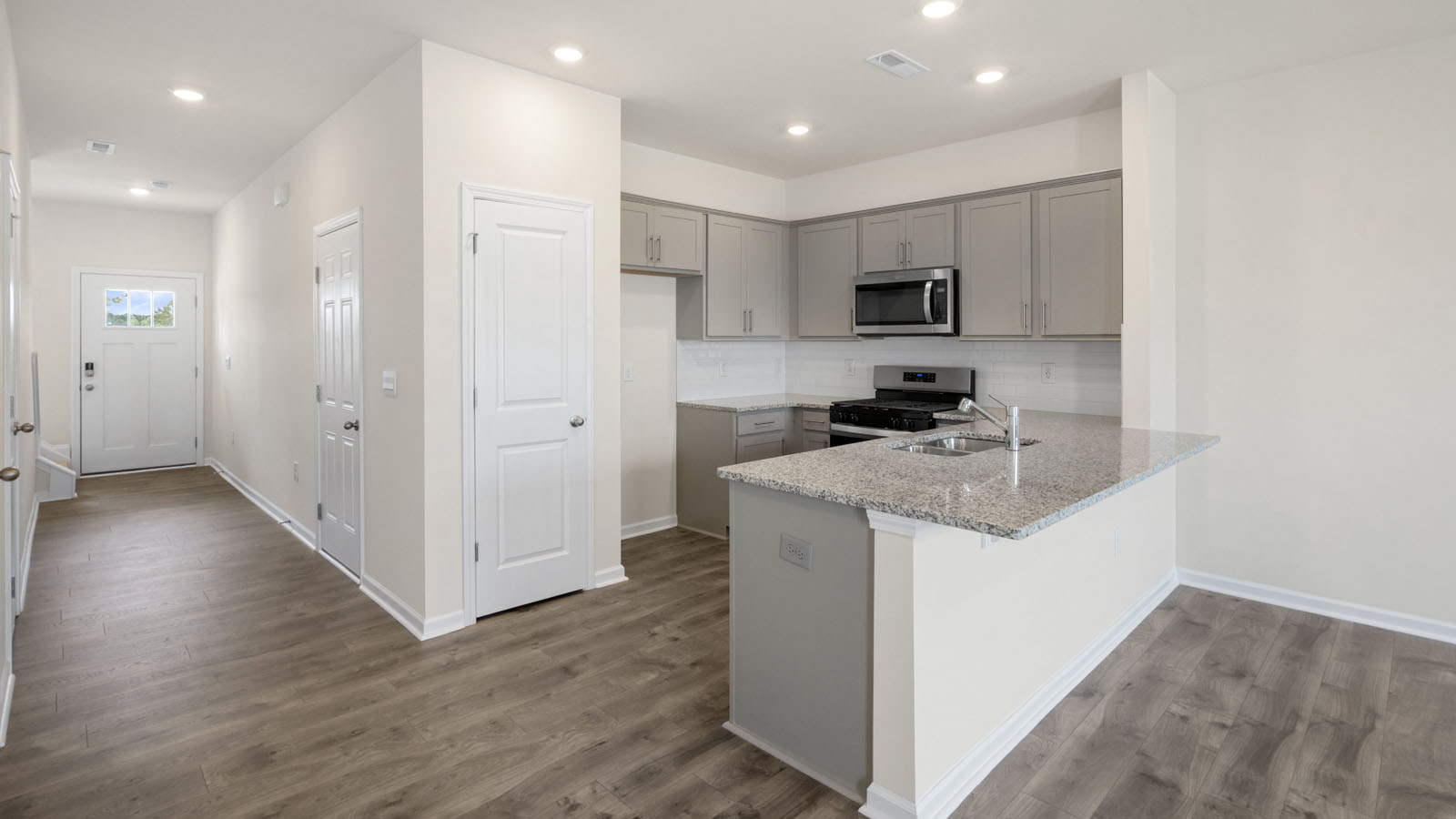 Kitchen with grey cabinets