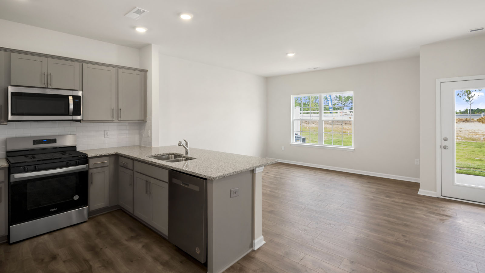 Kitchen with grey cabinets