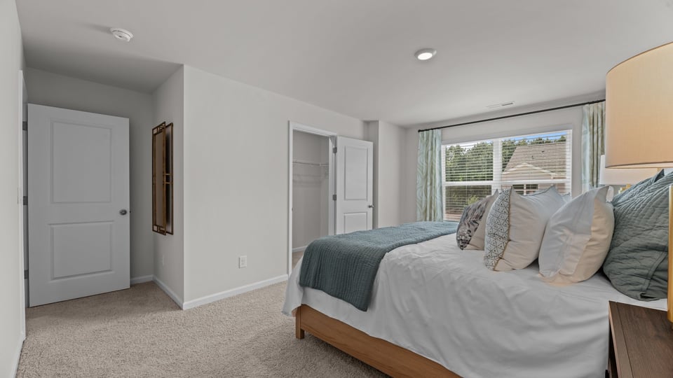 Bedroom with carpet flooring