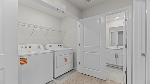 laundry room with washer and dryer
