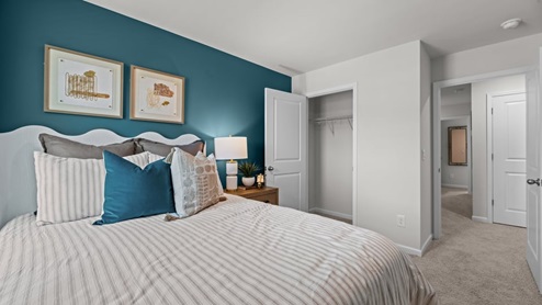 secondary bedroom featuring closet