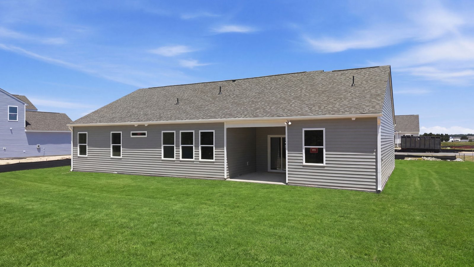 rear view of home with back yard view