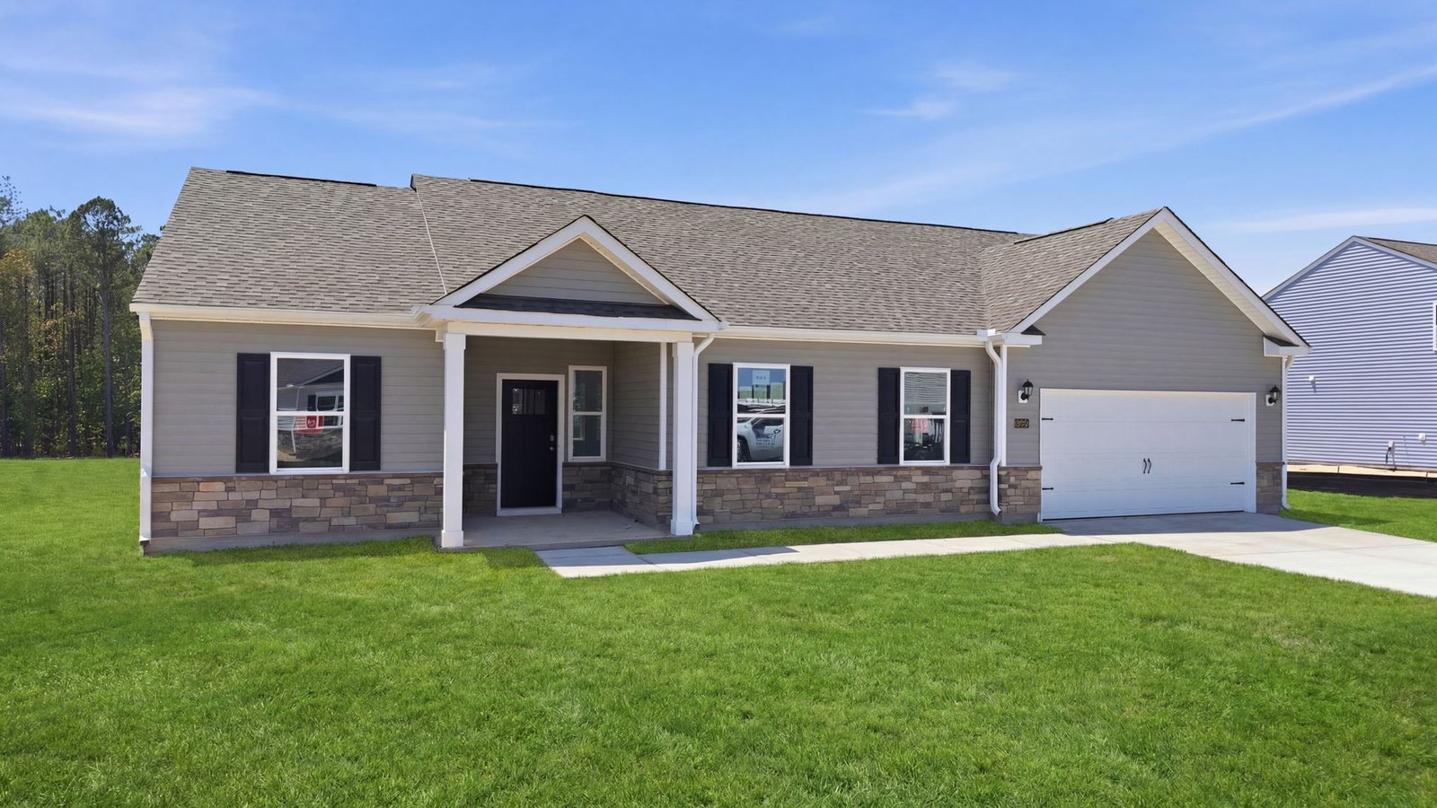 exterior of home with attached two car garage and driveway