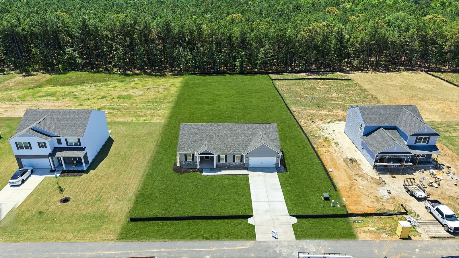aerial view of home and lot
