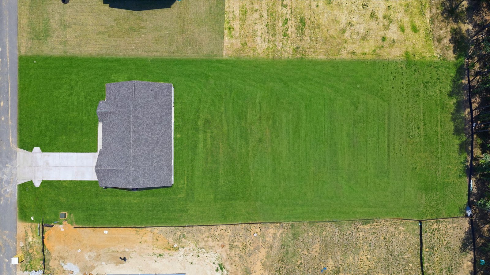 aerial photo view of home and lot with back yard