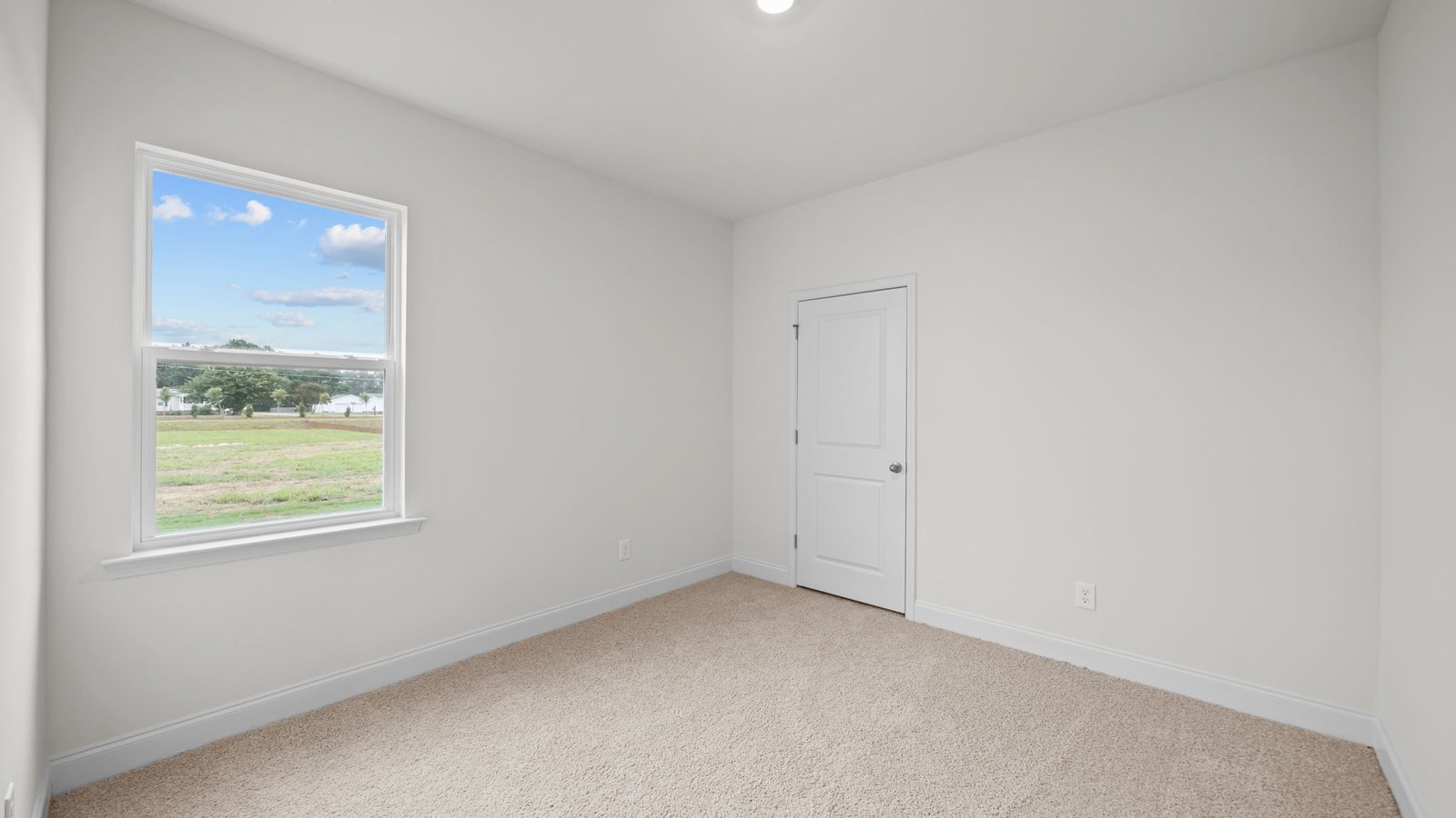carpeted secondary bedroom