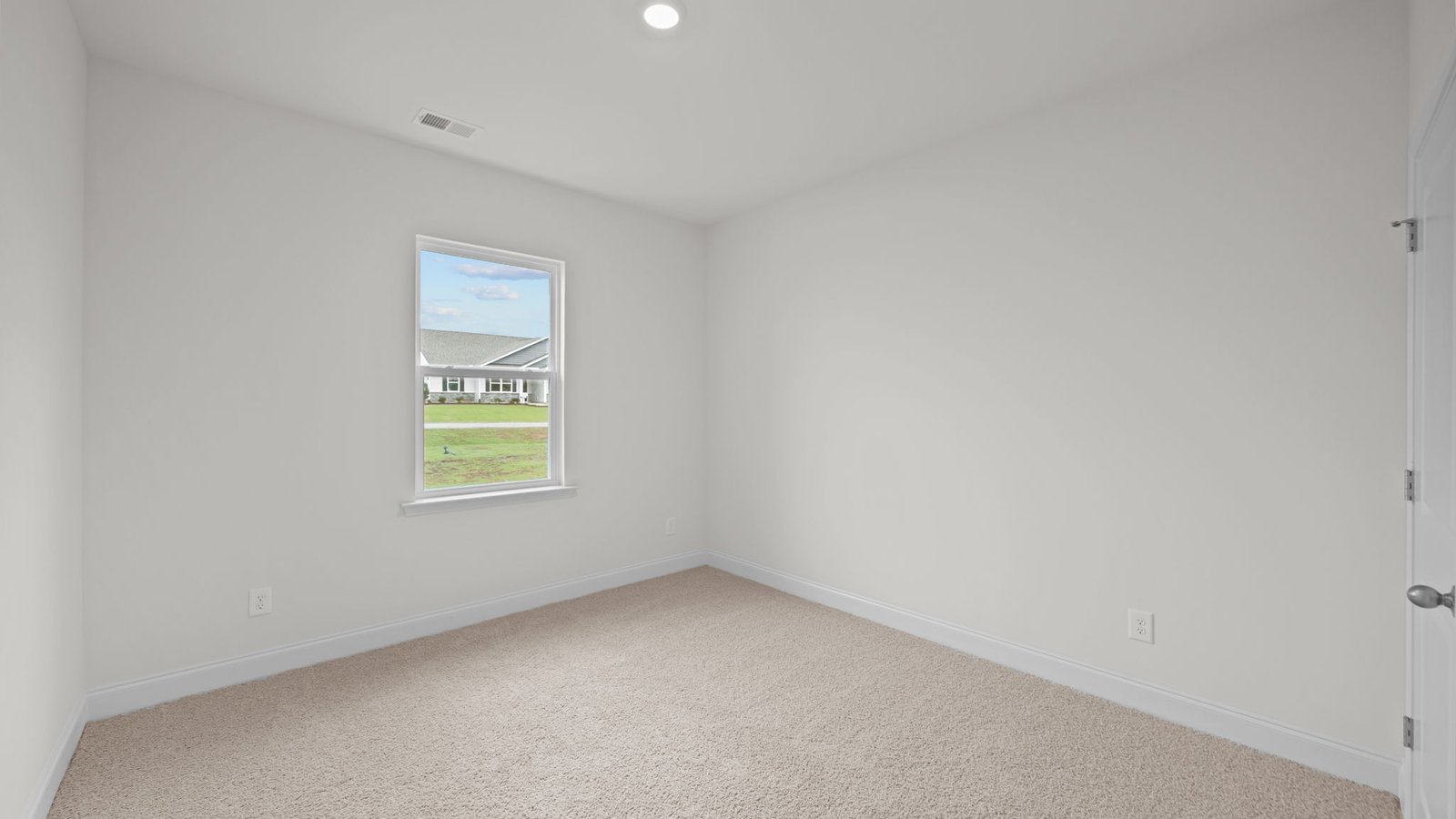 carpeted secondary bedroom