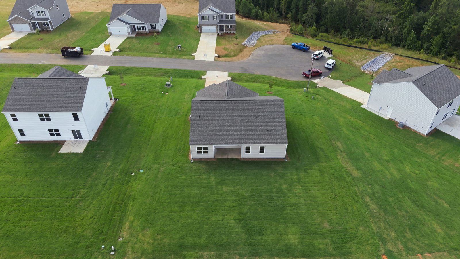 aerial view of home and lot