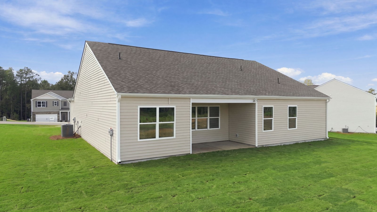 rear view of home with covered back patio