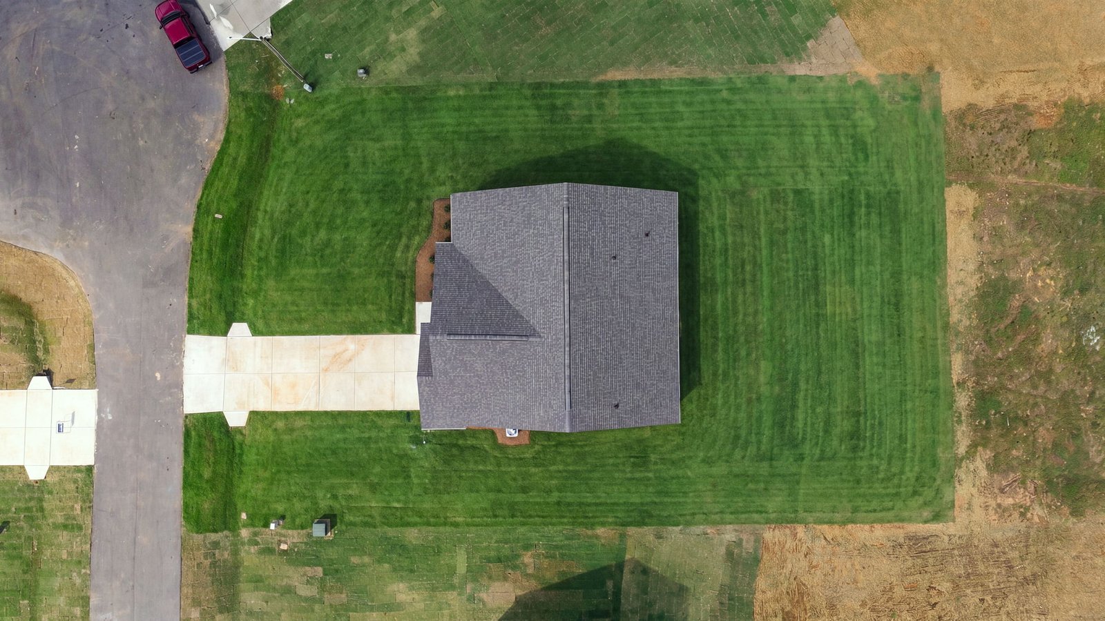 aerial view of home and lot