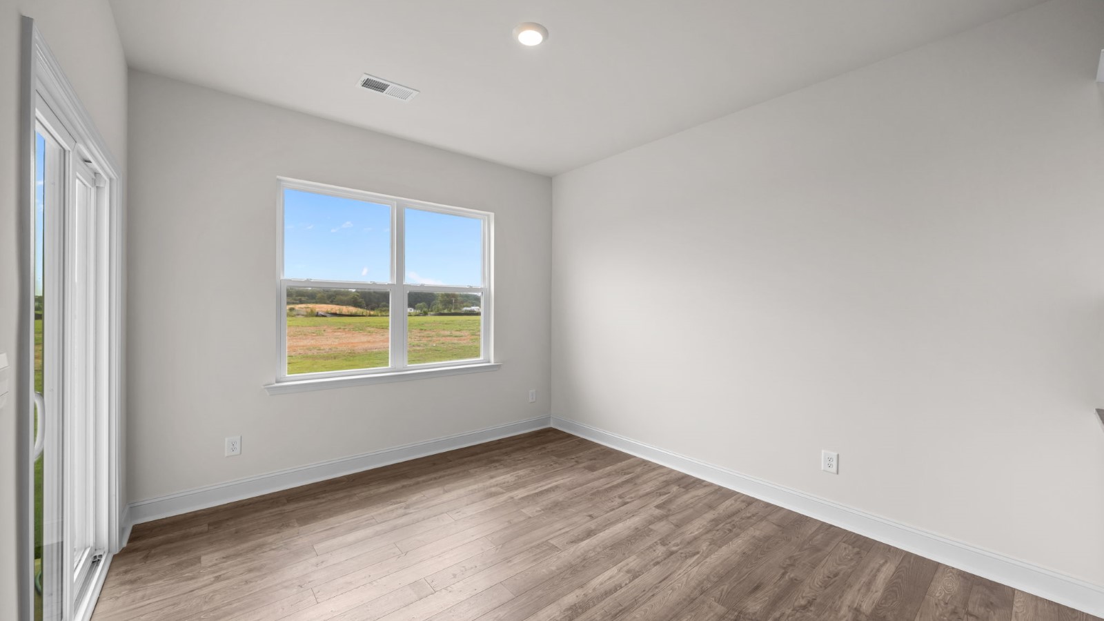 Dining area with revwood flooring