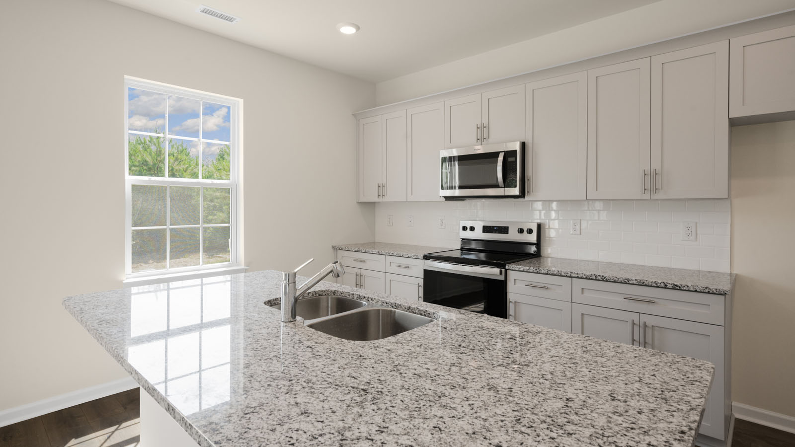 Kitchen with white cabinets
