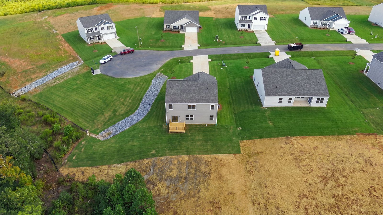 aerial view of home and lot