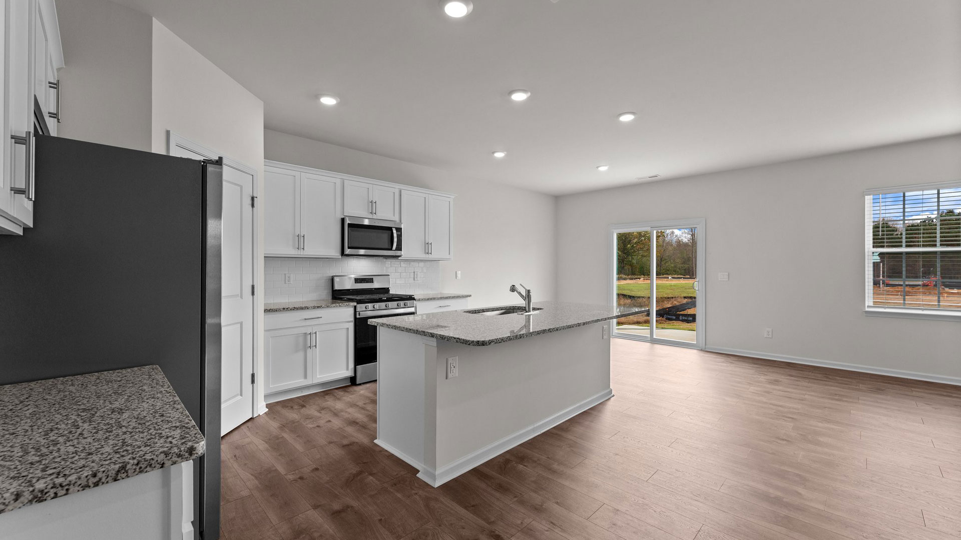 open concept kitchen and dining area