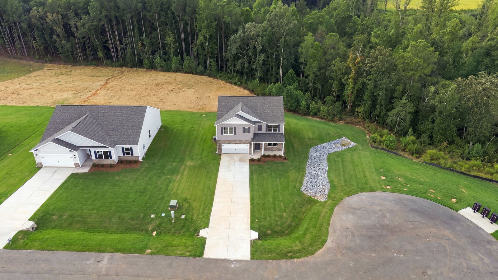 aerial view of home and lot