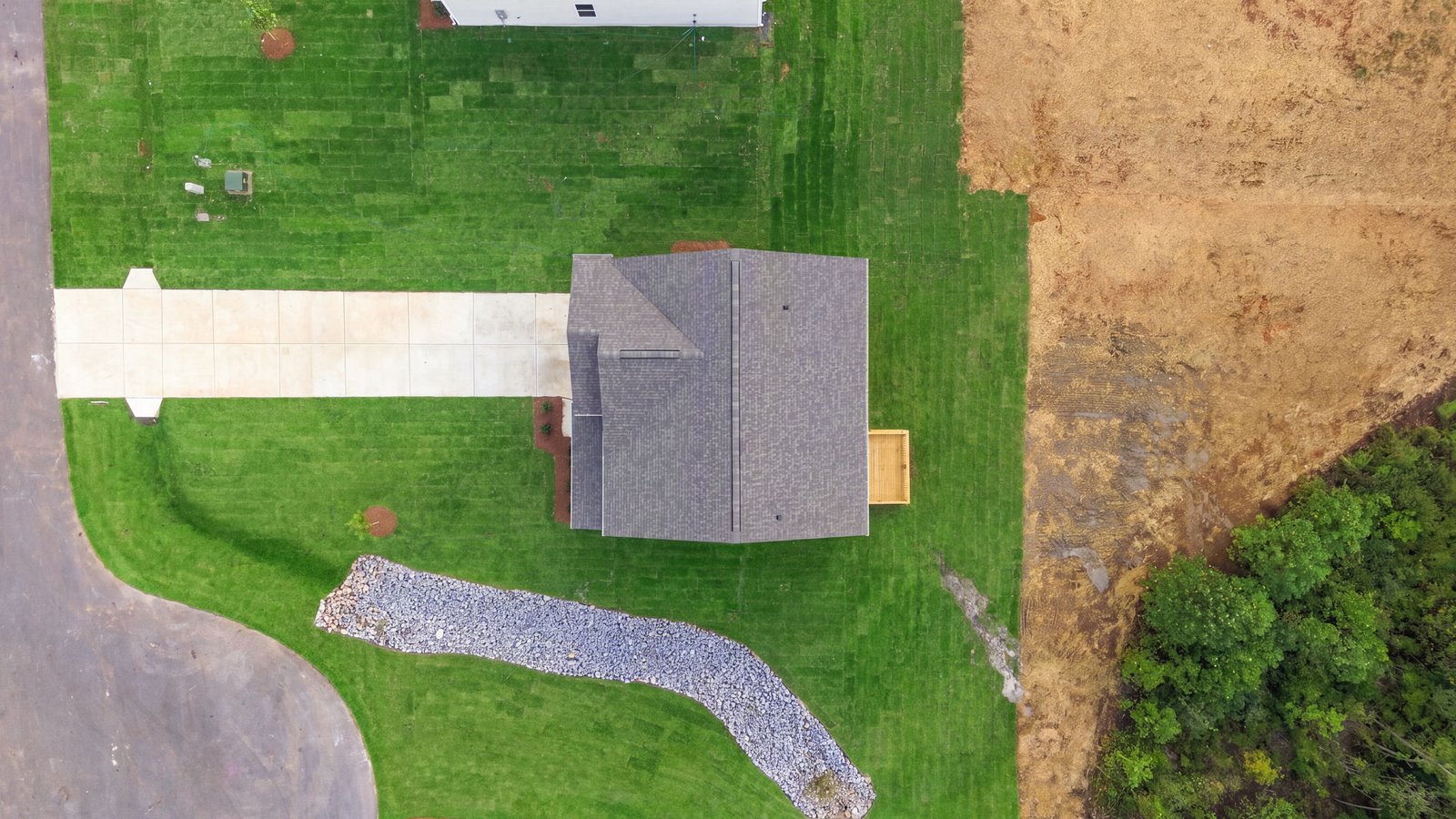 aerial view of home and lot