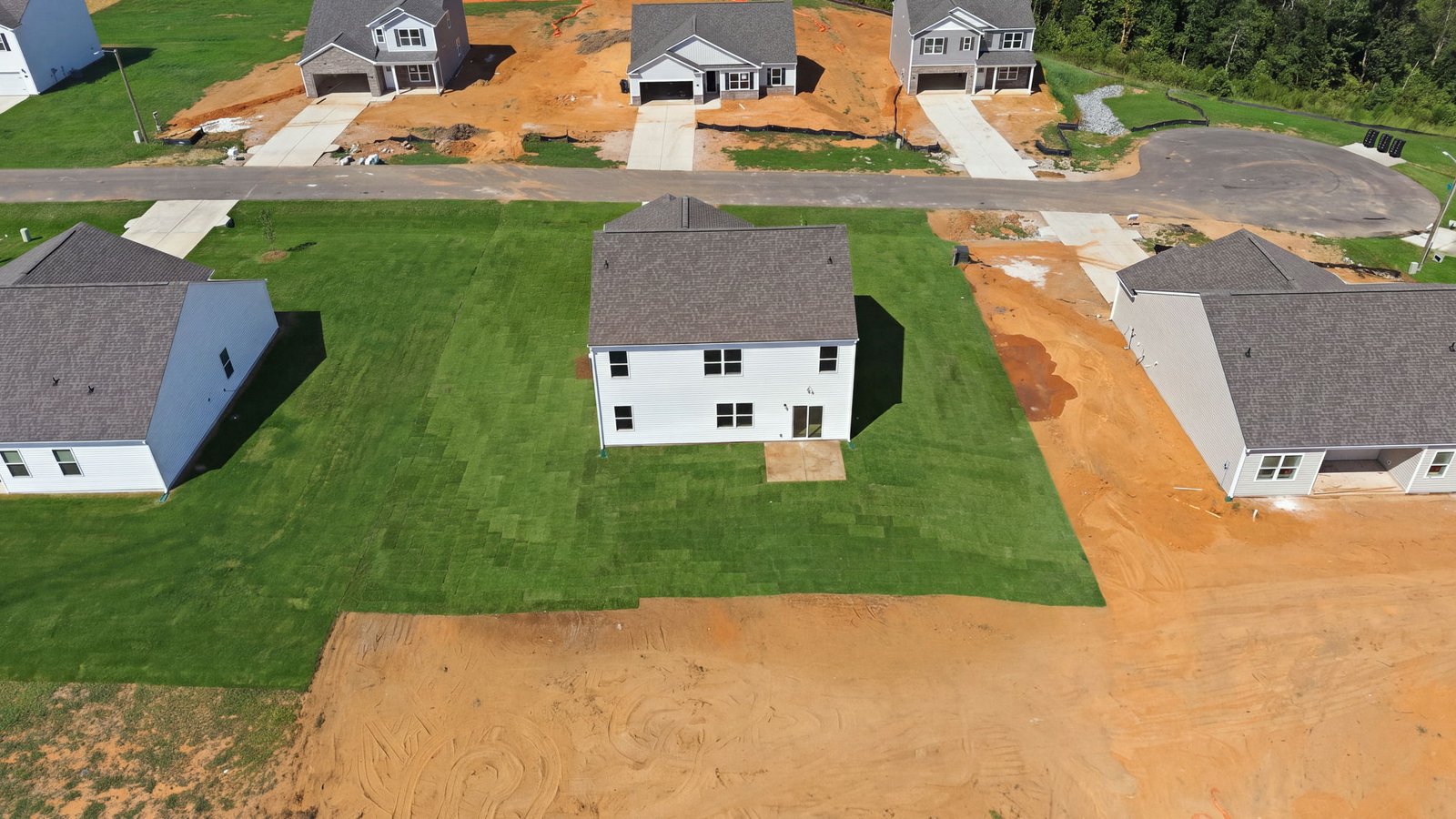 aerial view of home and lot
