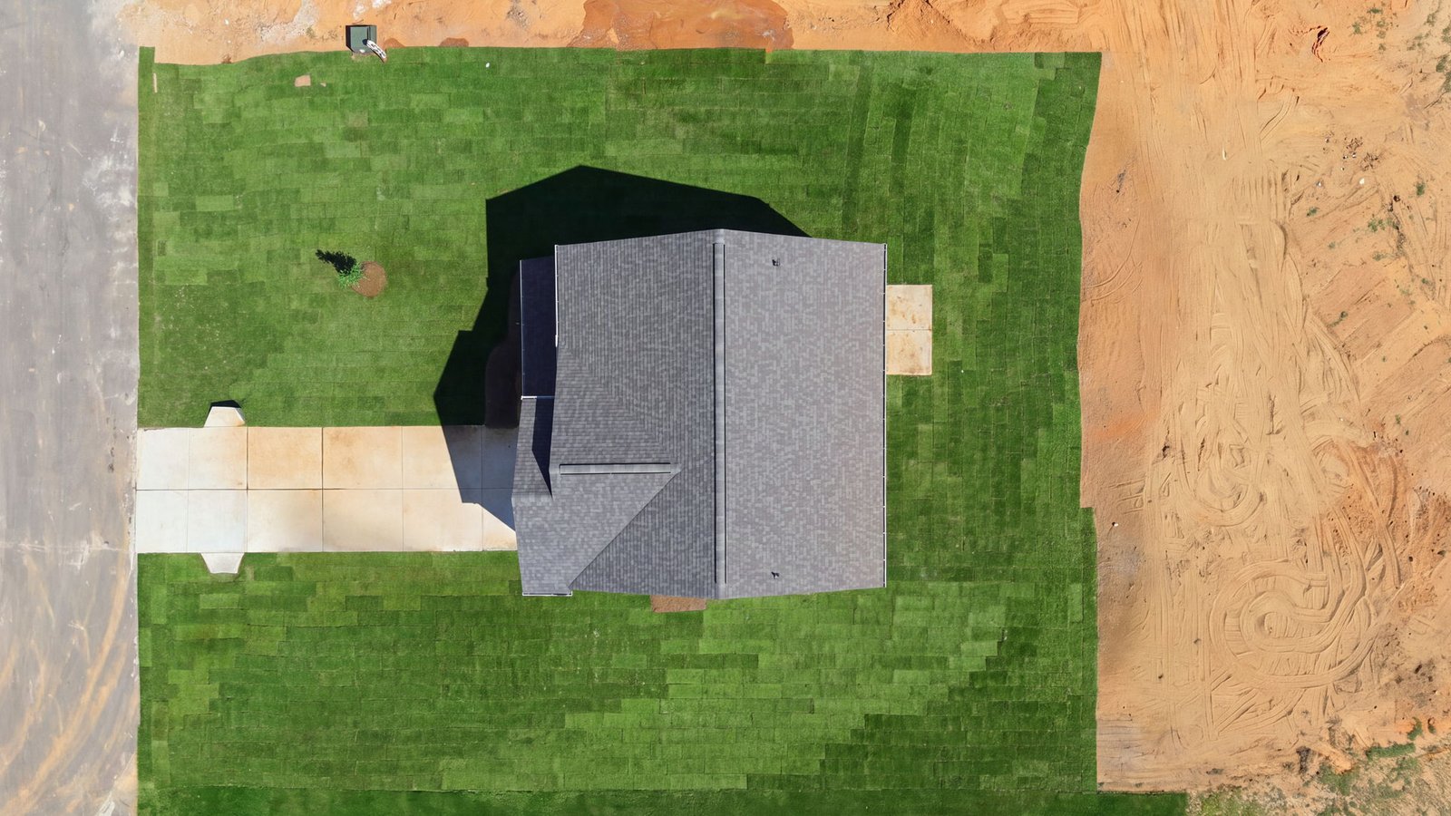 aerial view of home and lot